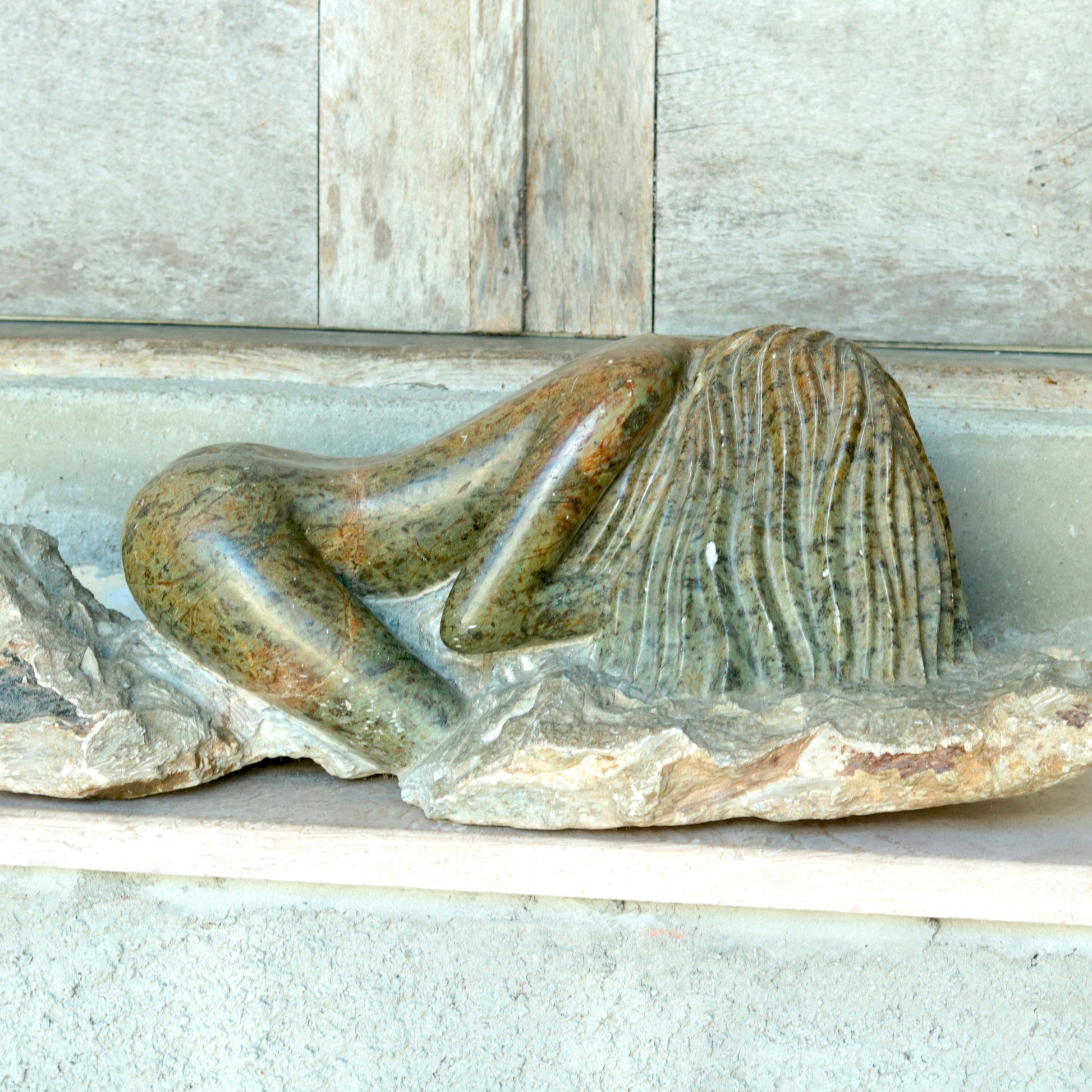Escultura Feminina em Pedra Sabão de Carlos Almeida de 1991