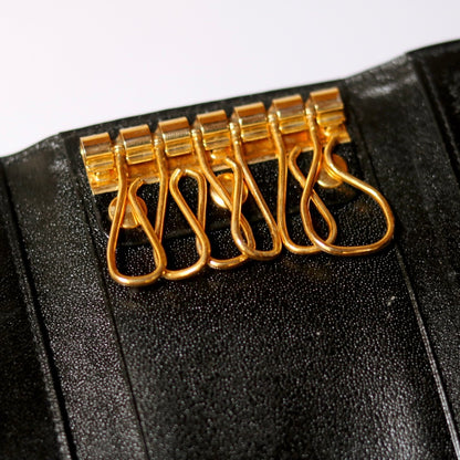 Porta-chaves Montblanc Meisterstück preto com detalhes em dourado folhado a ouro